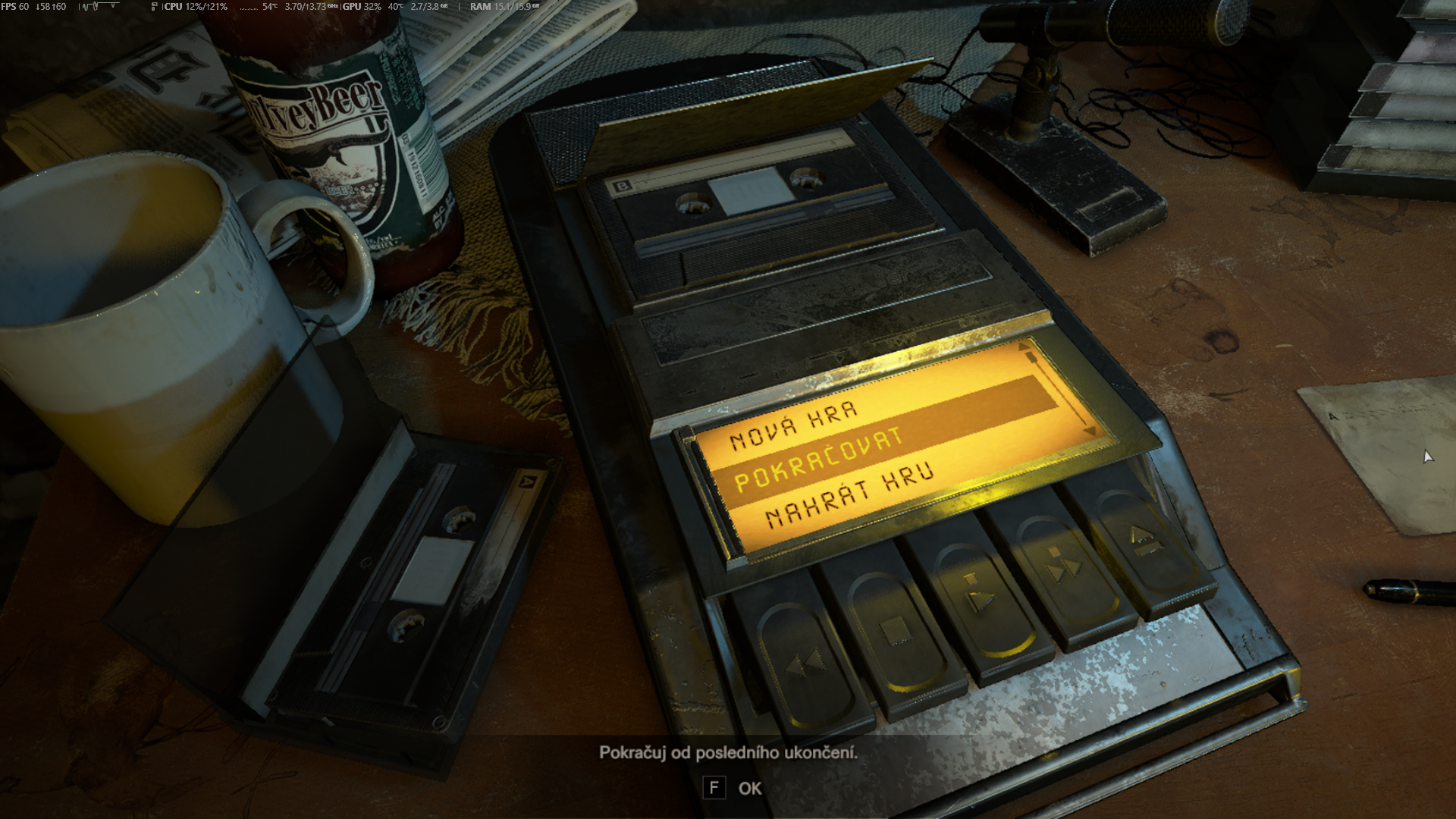 the title screen of resident evil seven, but the text on the tape player is in Czech